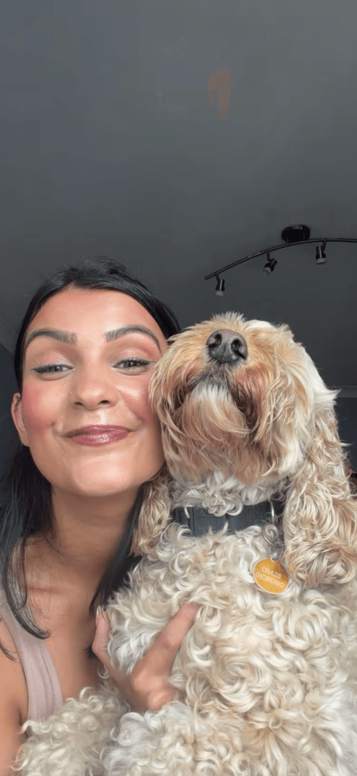 Alessandra with her dog Elmo